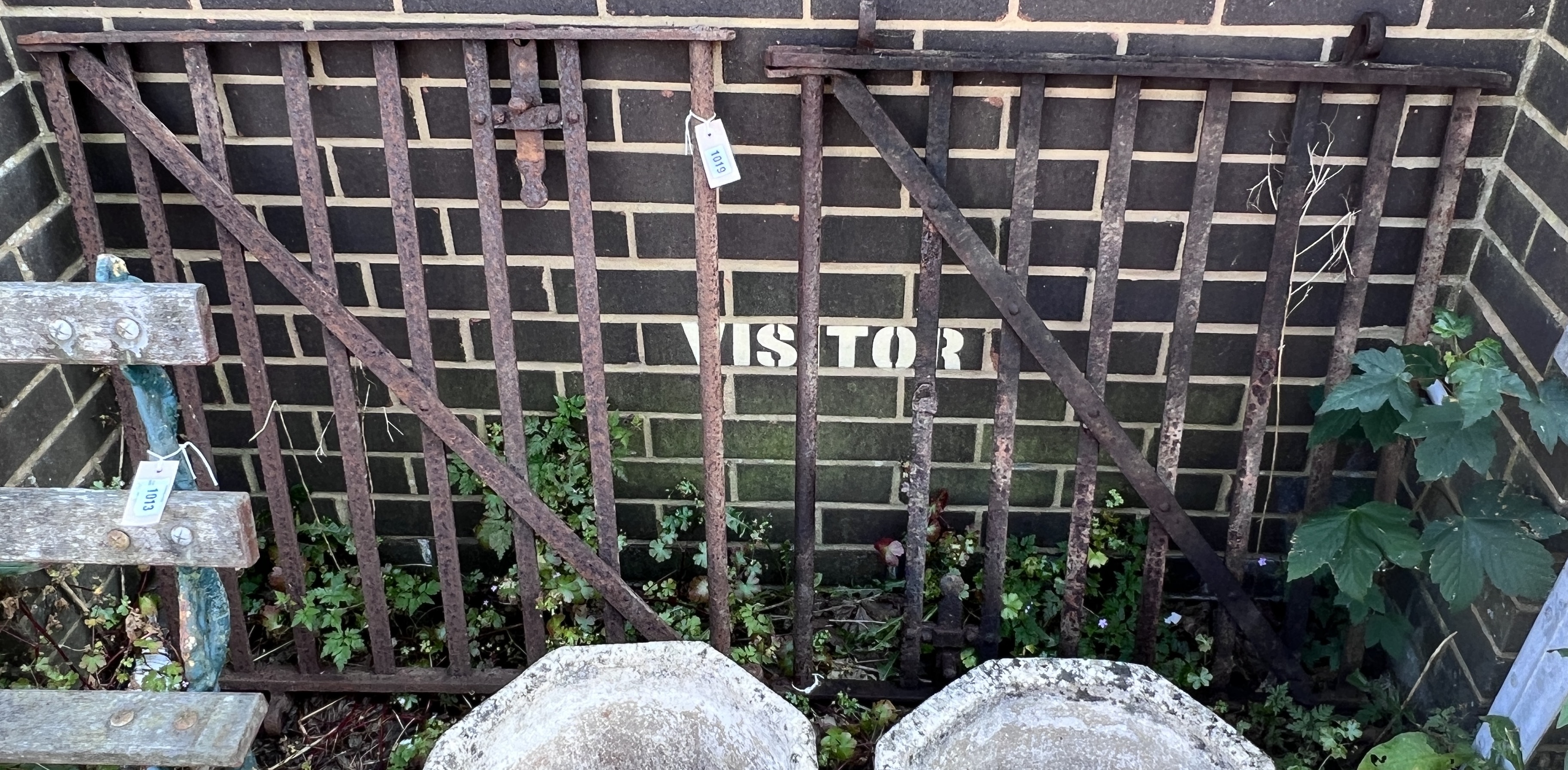 A pair of wrought iron garden gates, each width 84cm, height 78cm